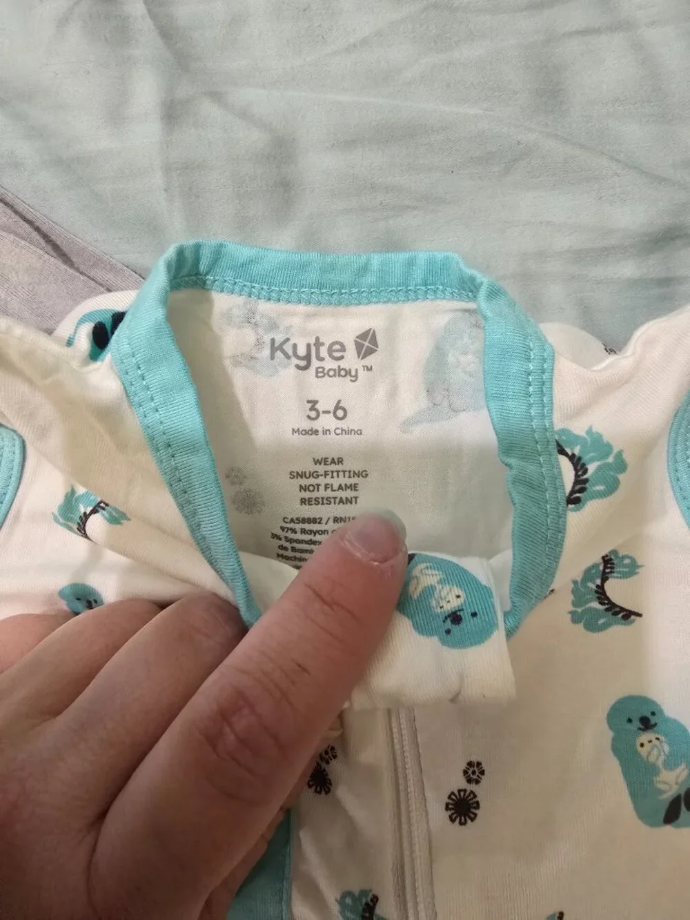 Kyte 3-6 month romper, pj, and an extra bamboo sleeper from Angel Baby